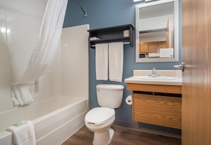Combined shower/bathtub, hair dryer, towels, soap