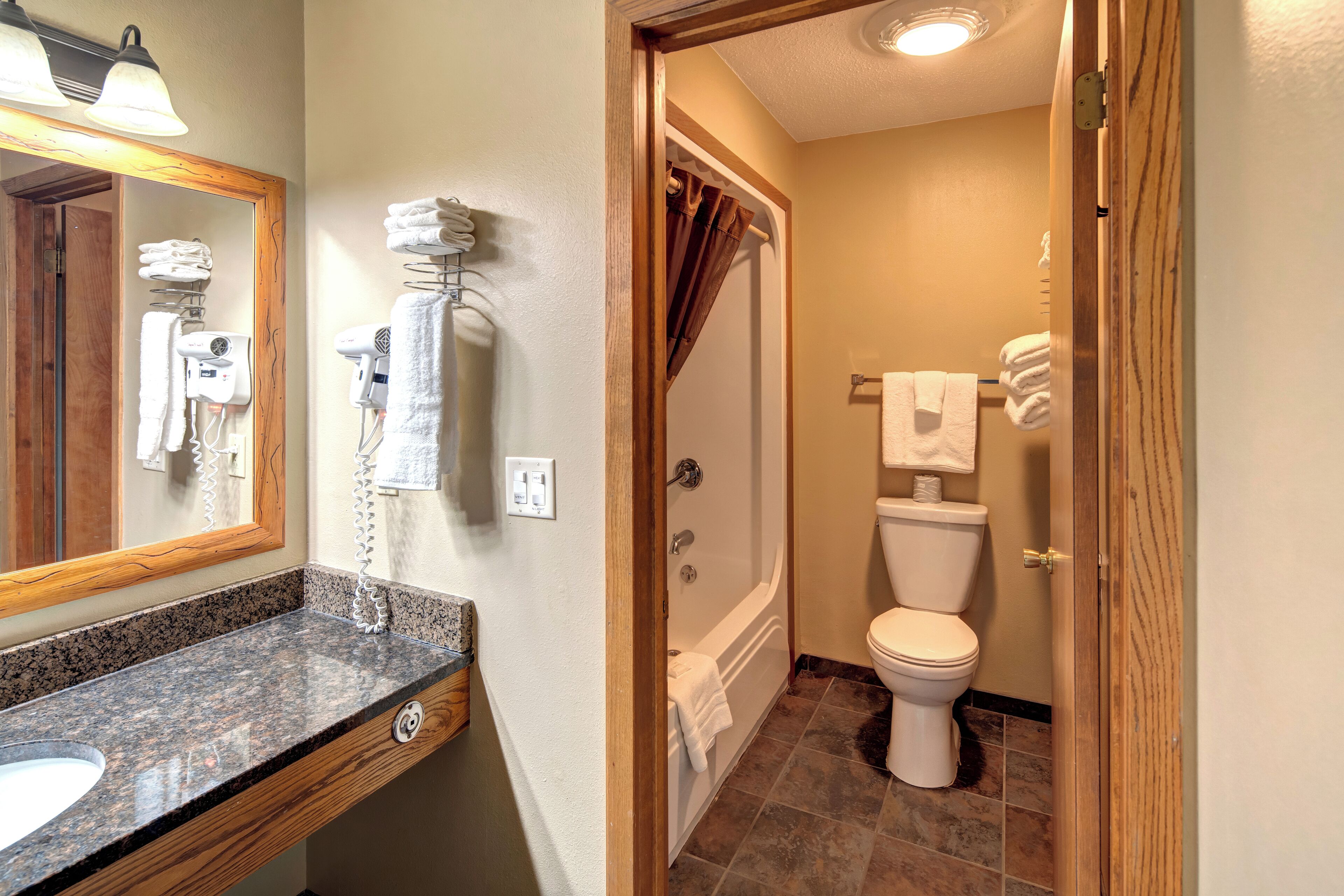 combined shower/bathtub, free toiletries, hair dryer, towels