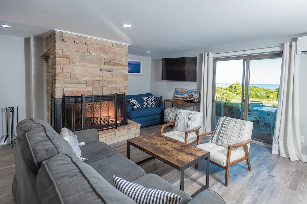 Suite, 1 habitación, chimenea | Área de sala de estar | Televisión