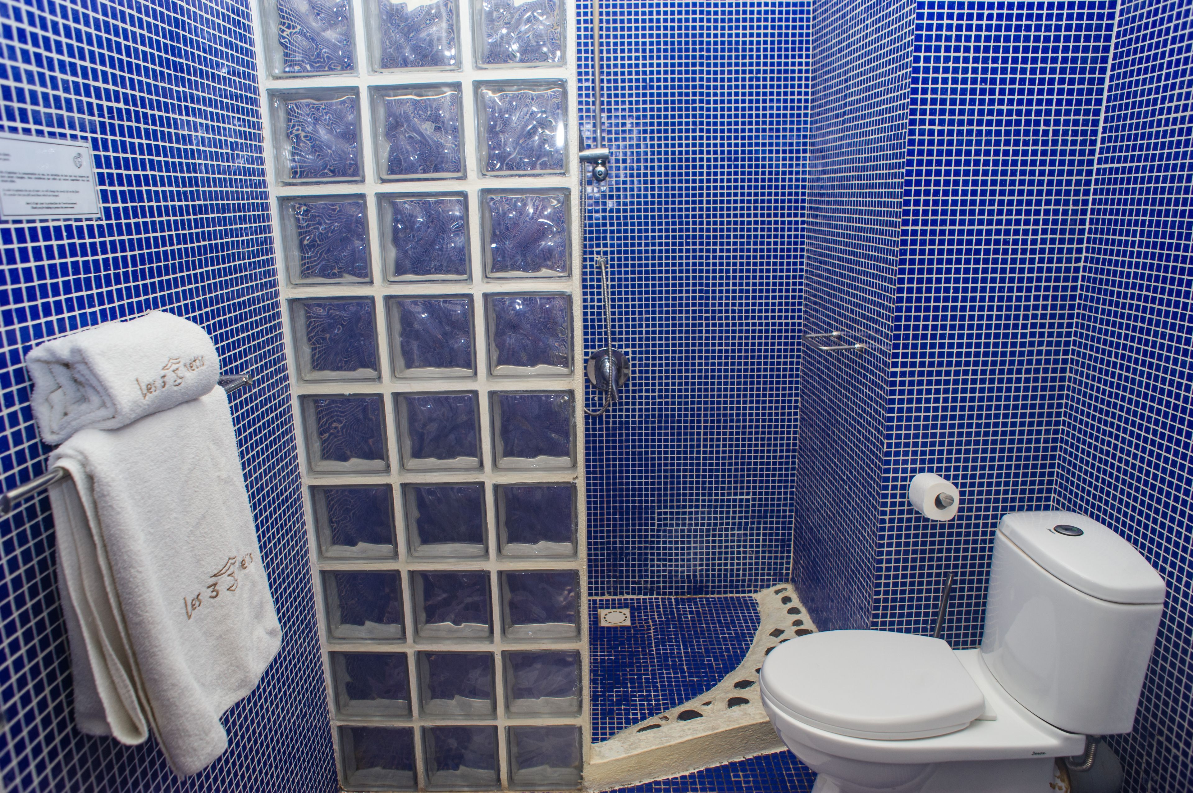 comfort single room | bathroom | shower, rainfall showerhead, designer toiletries, hair dryer