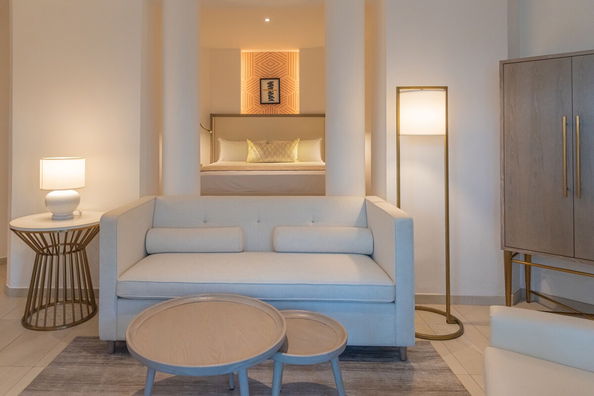 Bungalow | Living area | 50-inch plasma TV with cable channels, TV, foosball