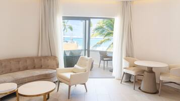 Honeymoon Platinum Suite, 1 King Bed (Spa) | Living area | 50-inch plasma TV with cable channels, TV, foosball