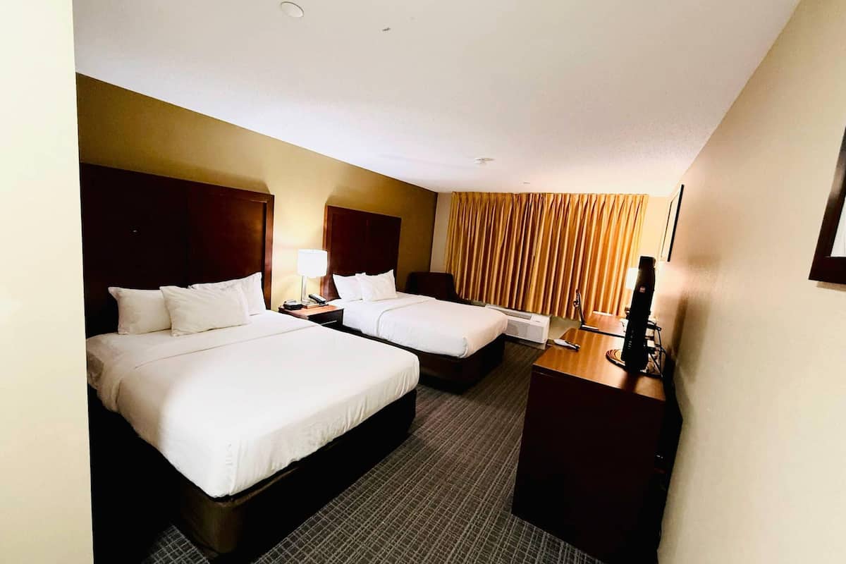 Standard Room, 2 Queen Beds, Non Smoking | 1 bedroom, down comforters, desk, blackout drapes