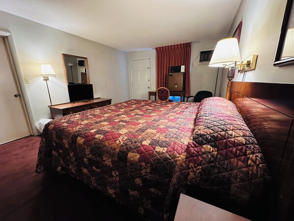 One king bed non smoking | Desk, blackout drapes, iron/ironing board, free WiFi