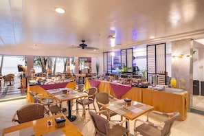 Breakfast, lunch, dinner served; beach views