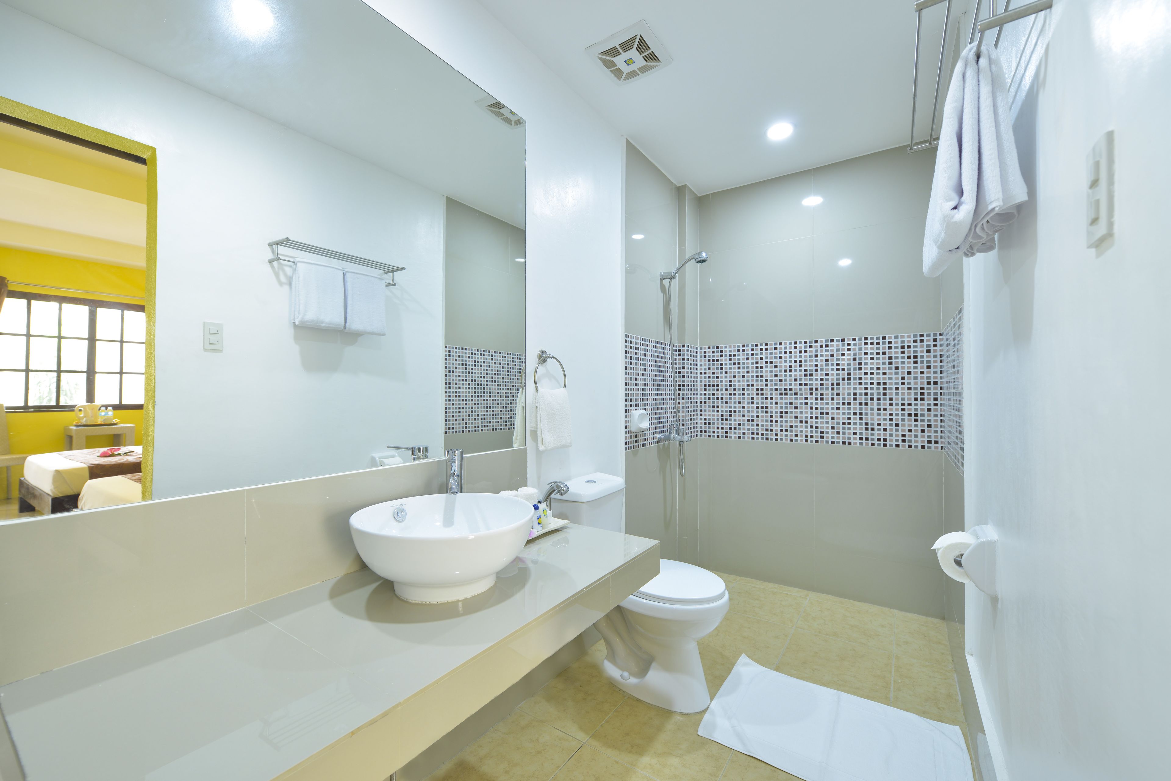 superior deluxe | bathroom | shower, rainfall showerhead, free toiletries, hair dryer