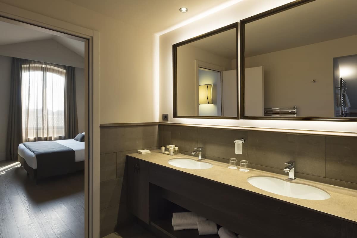 free toiletries, hair dryer, slippers, bidet