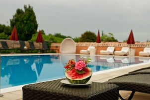Indoor pool, 2 outdoor pools, open 9:00 AM to 7:00 PM, pool umbrellas