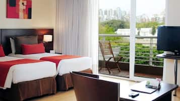 Premium bedding, memory foam beds, minibar, in-room safe