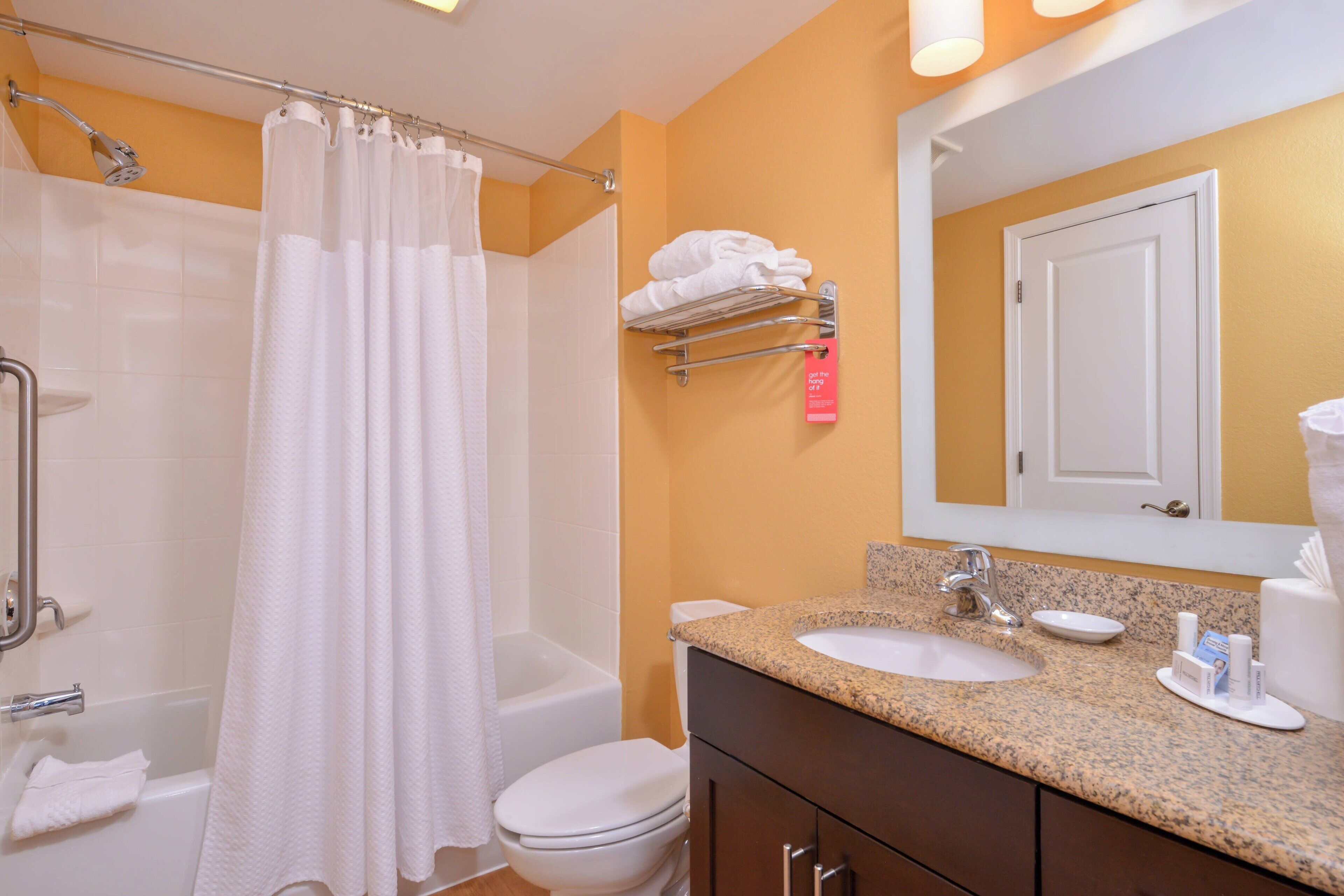 combined shower/bathtub, free toiletries, hair dryer, towels