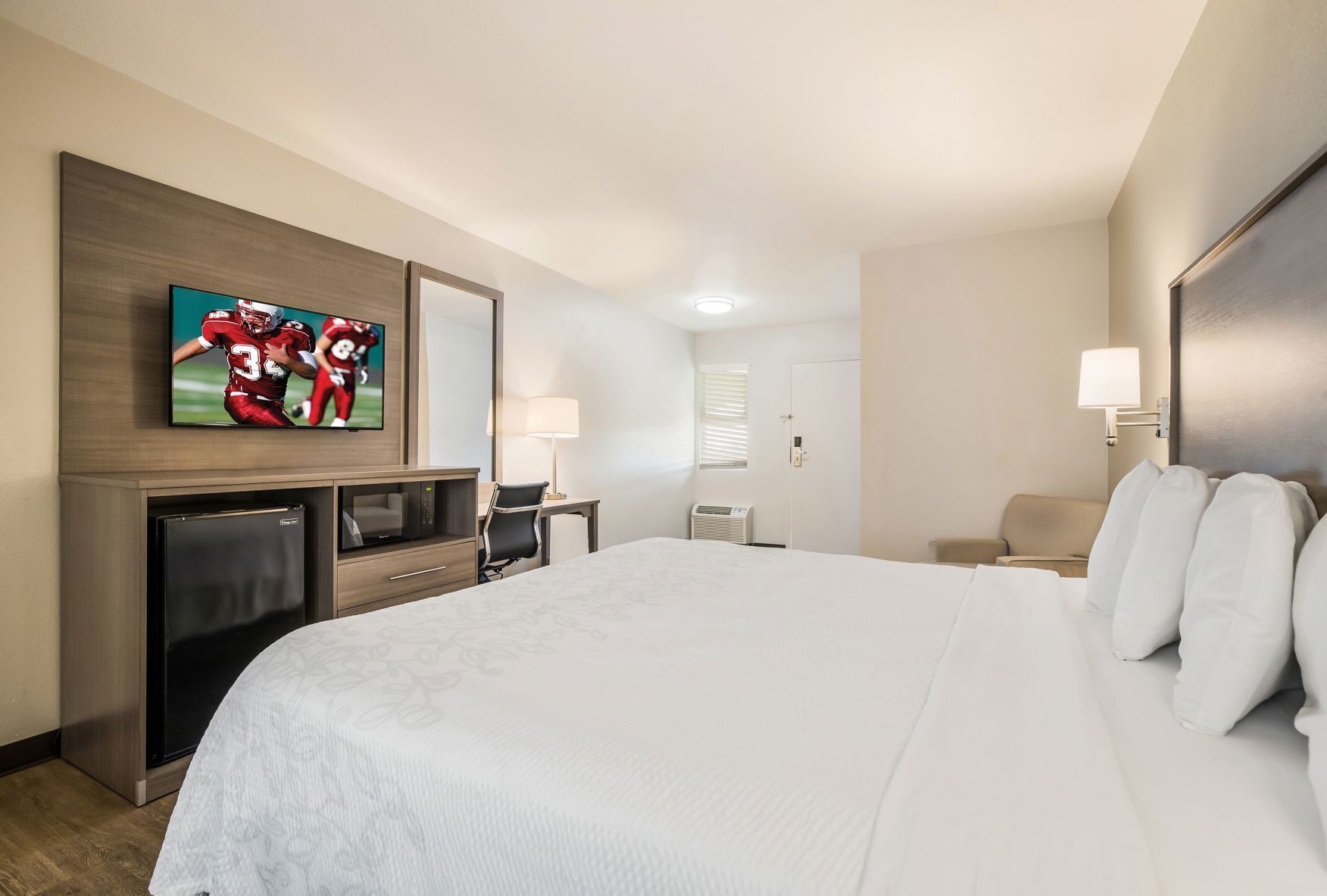 Premium bedding, blackout drapes, iron/ironing board