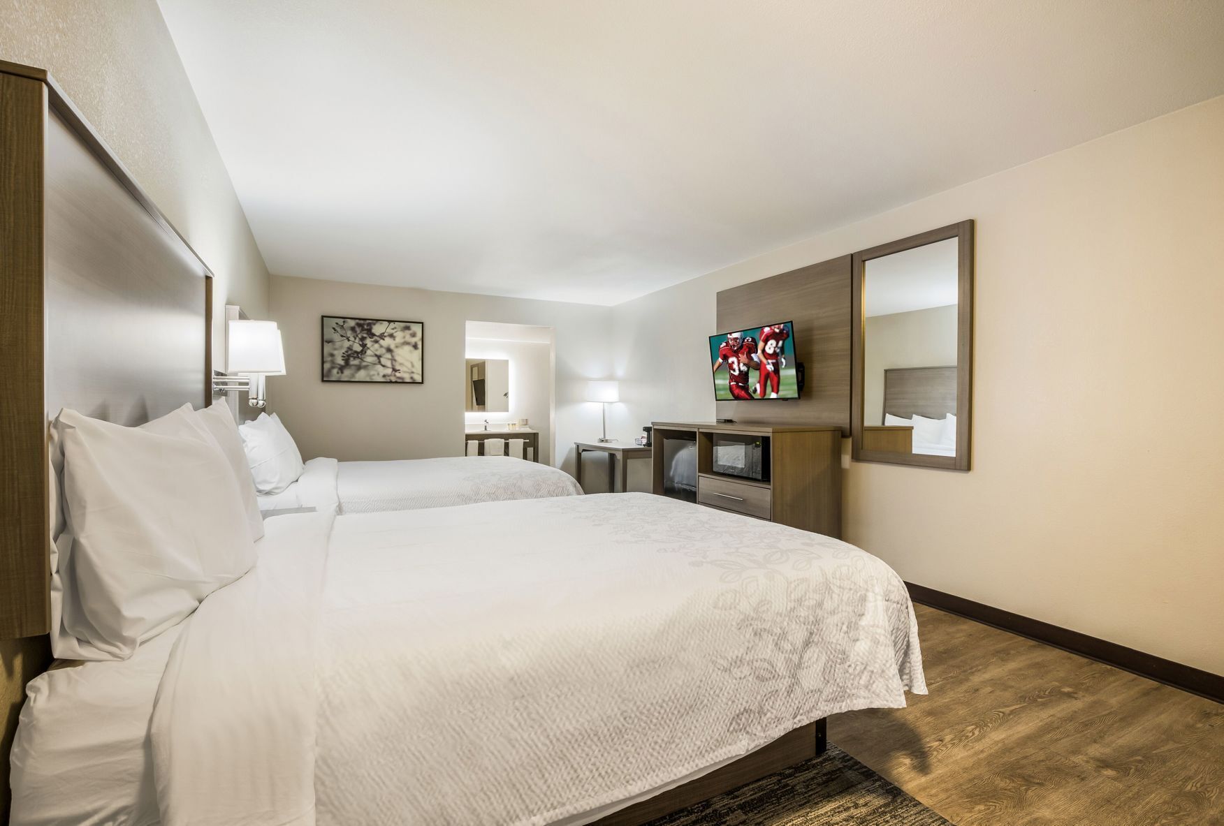 Premium bedding, blackout drapes, iron/ironing board