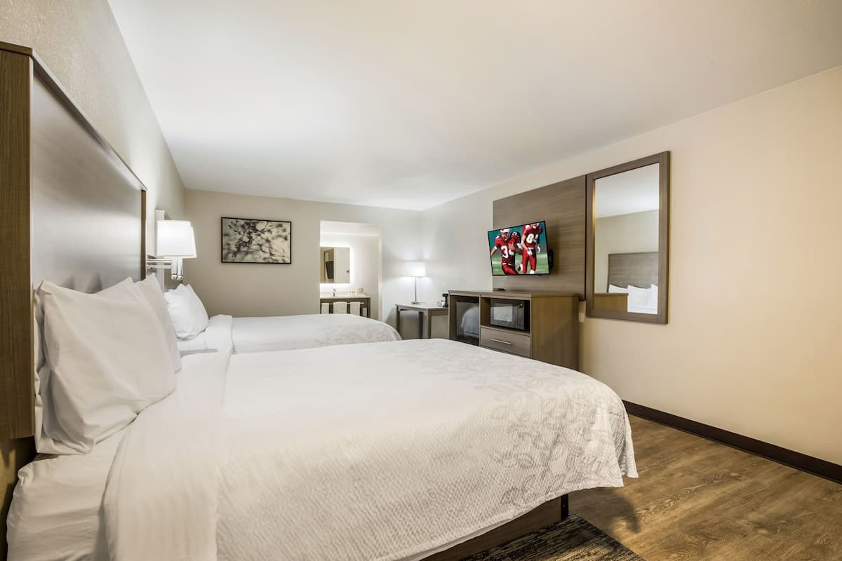 Premium bedding, blackout curtains, iron/ironing board