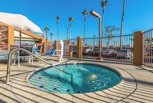 Outdoor pool, pool umbrellas, sun loungers