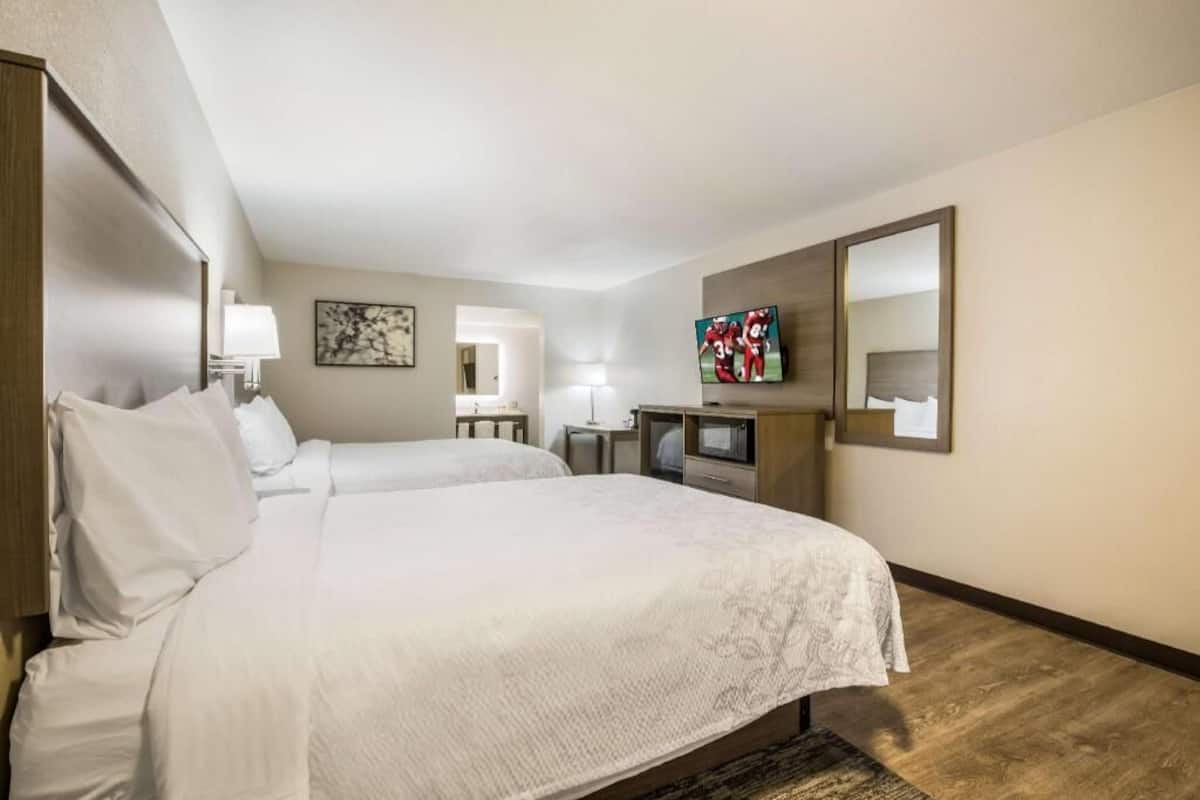 Premium bedding, blackout curtains, iron/ironing board