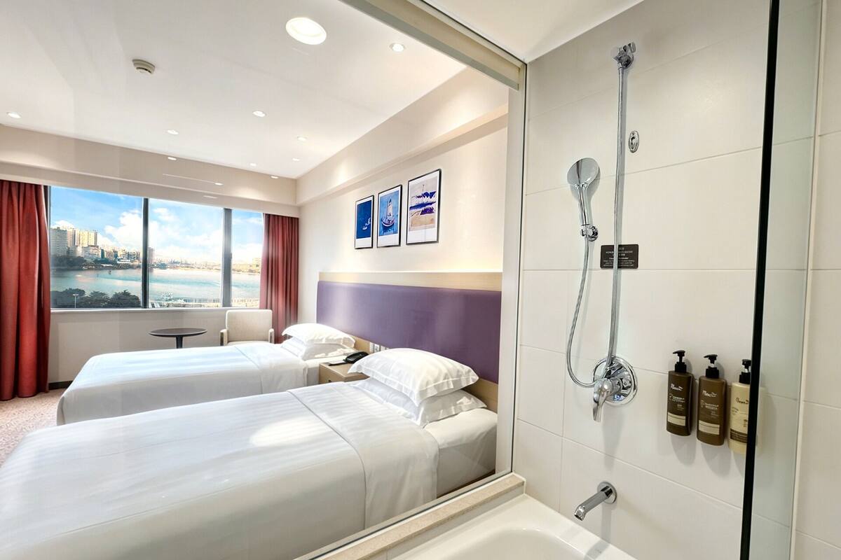 Chambre Élite, 2 lits jumeaux | Minibar, coffre-fort, bureau, fer et planche à repasser