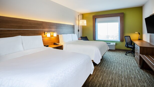 A hotel room with two beds, a desk, a chair, a TV, and a window with a view. - Holiday Inn Express Hotel & Suites Fairburn by IHG (Fairburn)