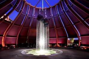 A spacious atrium with a central water feature and seating areas. - Isleta Resort and Casino (Albuquerque)
