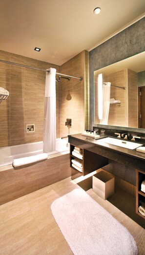 Combined shower/bathtub, deep-soaking bathtub, free toiletries