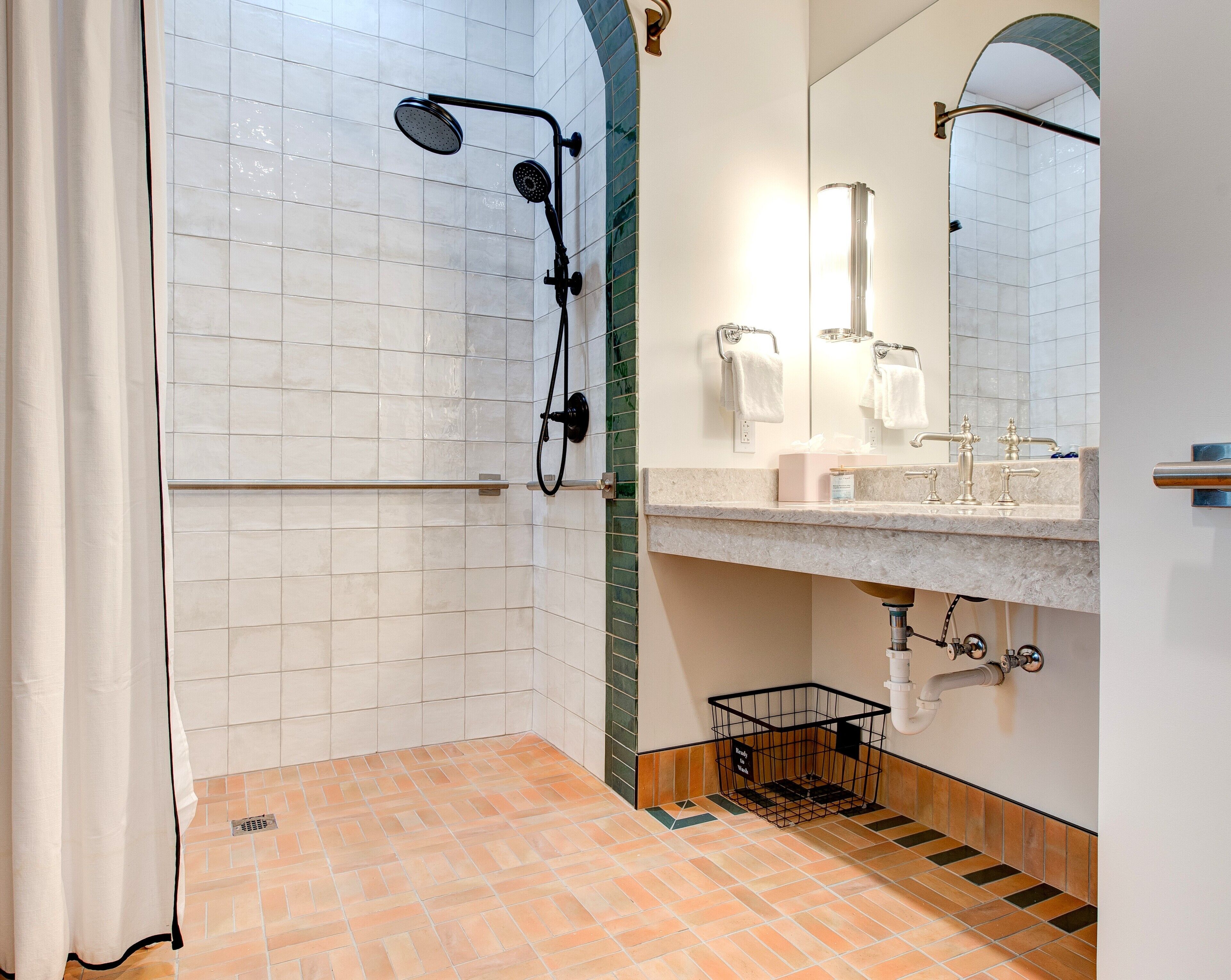combined shower/bathtub, eco-friendly toiletries, hair dryer, towels