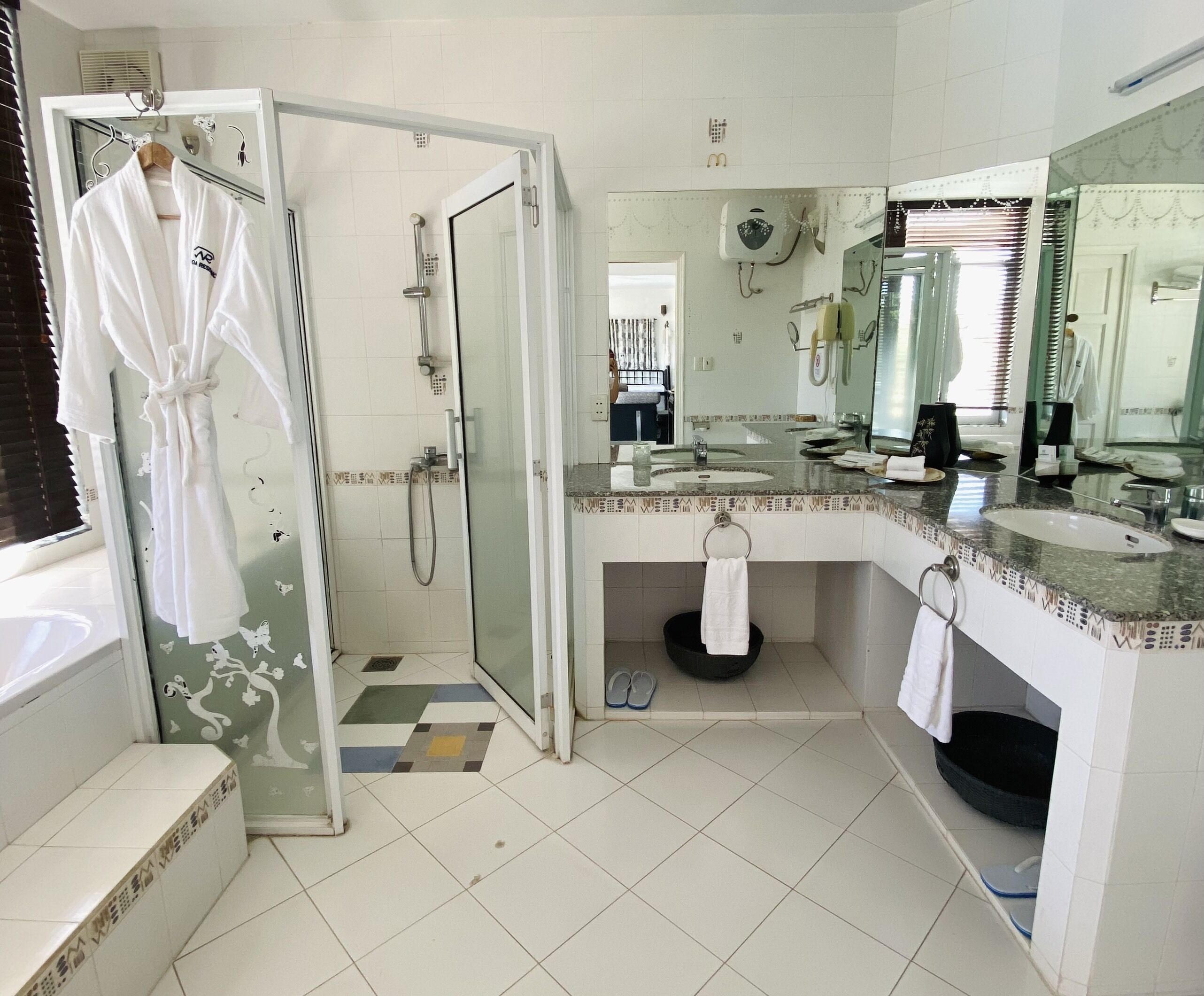 family villa | bathroom | shower, hydromassage showerhead, designer toiletries, hair dryer