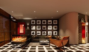 A modern lounge area with a sofa, armchair, and a fireplace. - Maven Ginza (Tokyo)