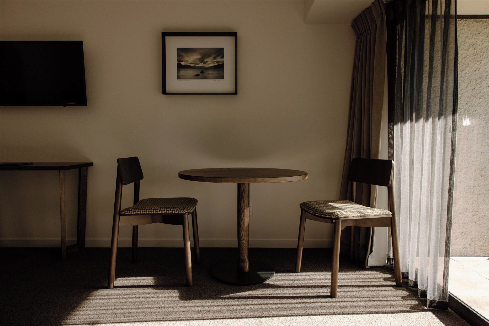 premium hotel room | living area | tv