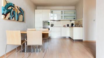 Apartment, Balcony, City View | Private kitchen | Full-size fridge, microwave, oven, stovetop