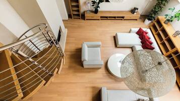 Penthouse, City View | Living area | Smart TV