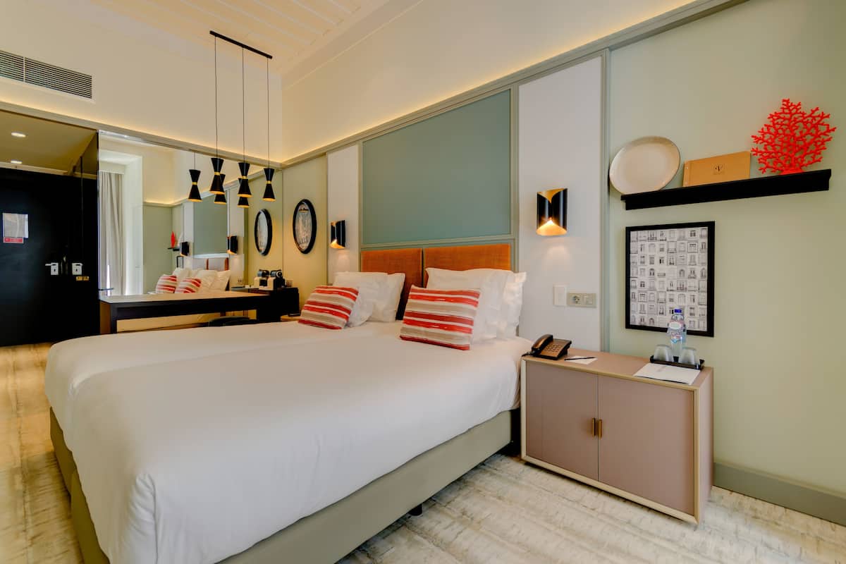 Premium bedding, down duvets, minibar, in-room safe