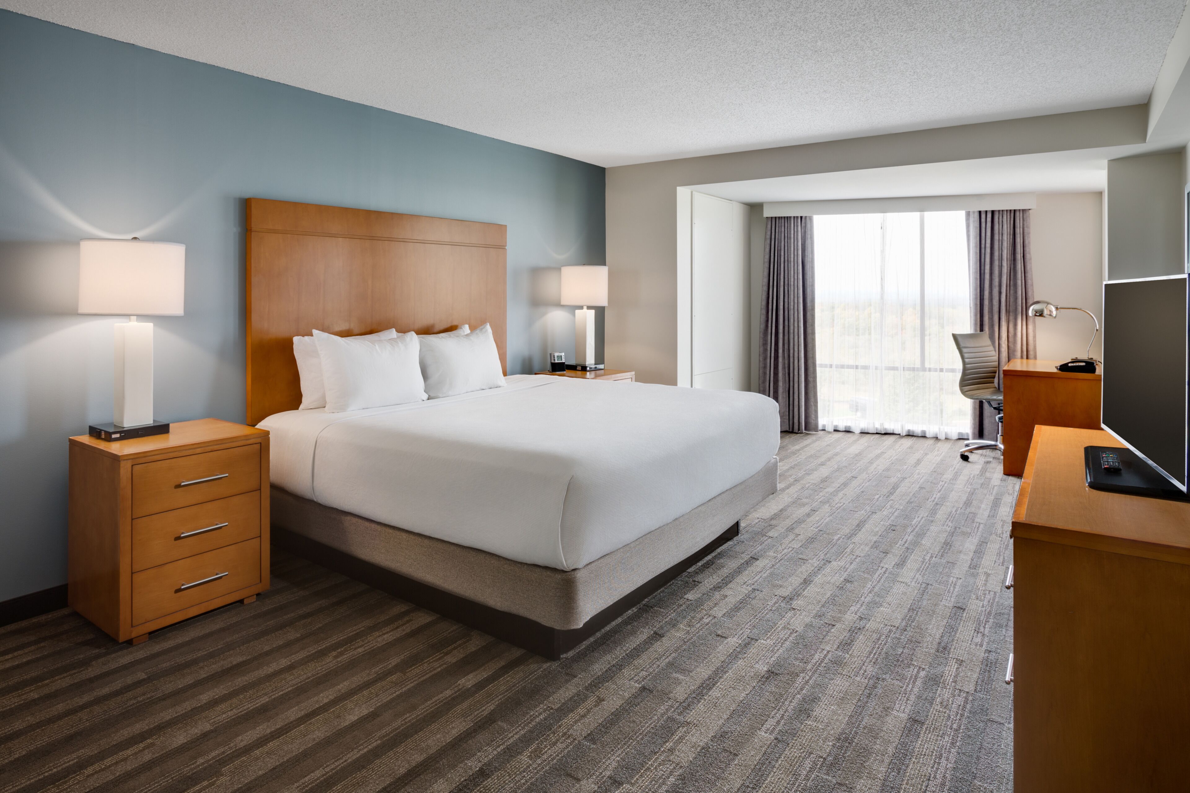 room, 1 king bed with sofa bed, accessible, non smoking (shower) | premium bedding, down duvets, in-room safe, desk