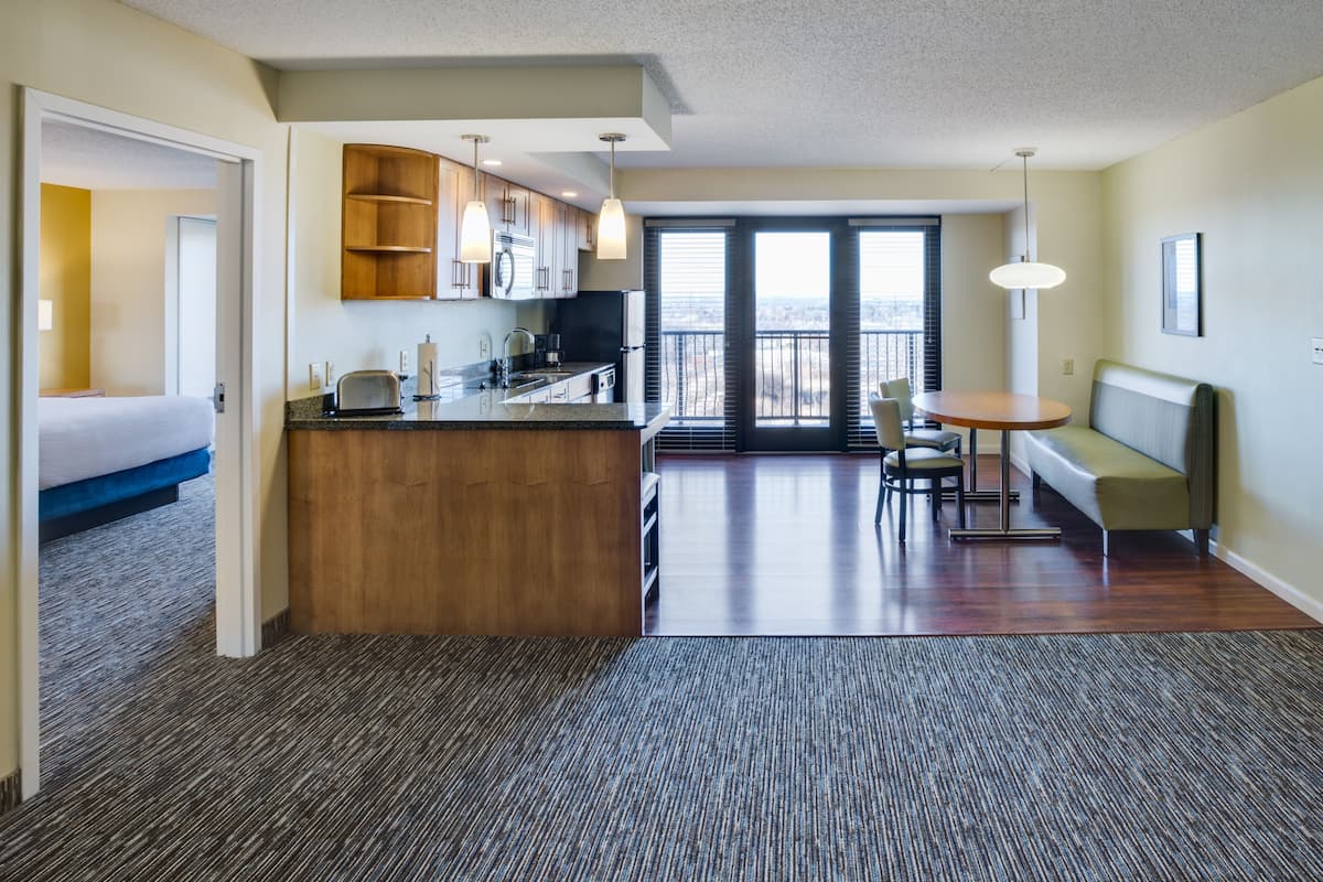 full-sized fridge, microwave, stovetop, dishwasher
