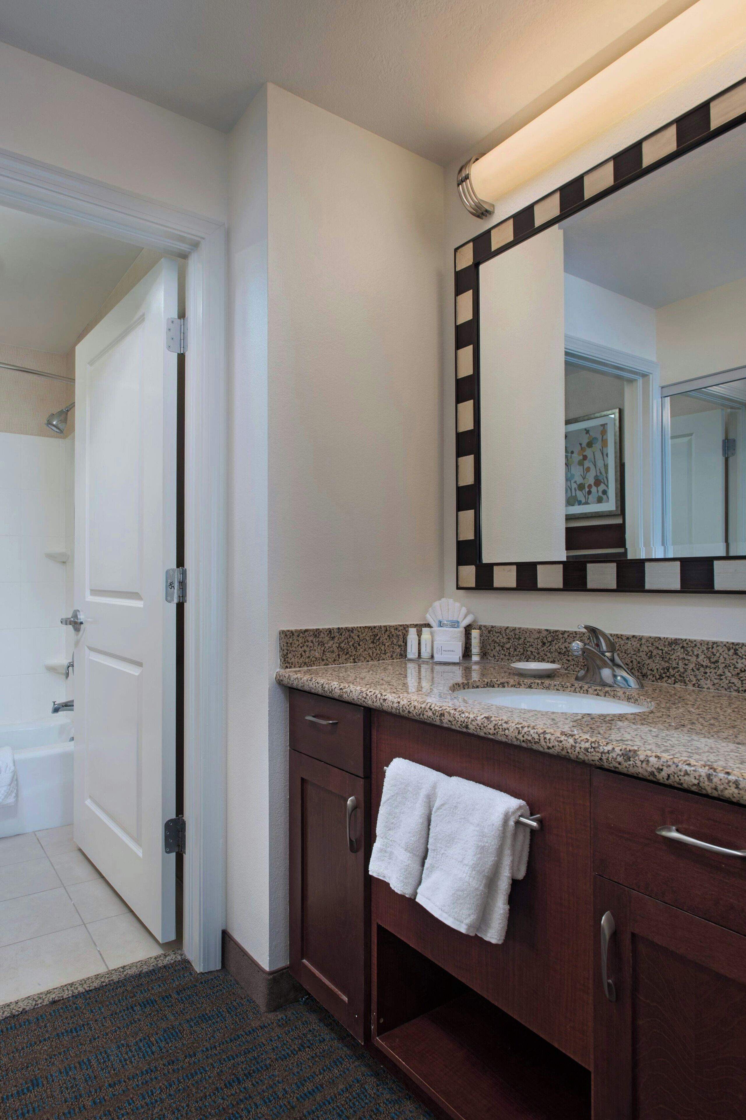 combined shower/bathtub, free toiletries, hair dryer, towels