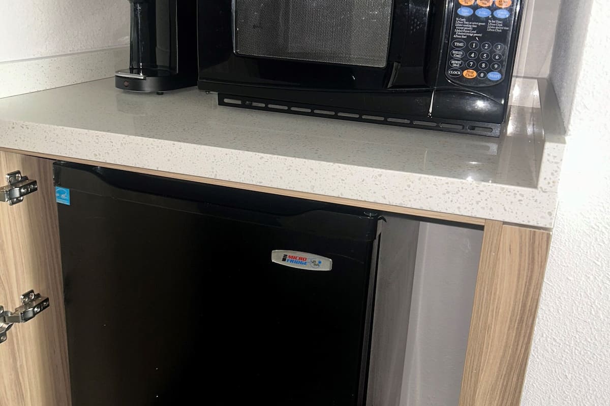 standard room, 2 queen beds, non smoking | pillow-top beds, in-room safe, desk, laptop workspace