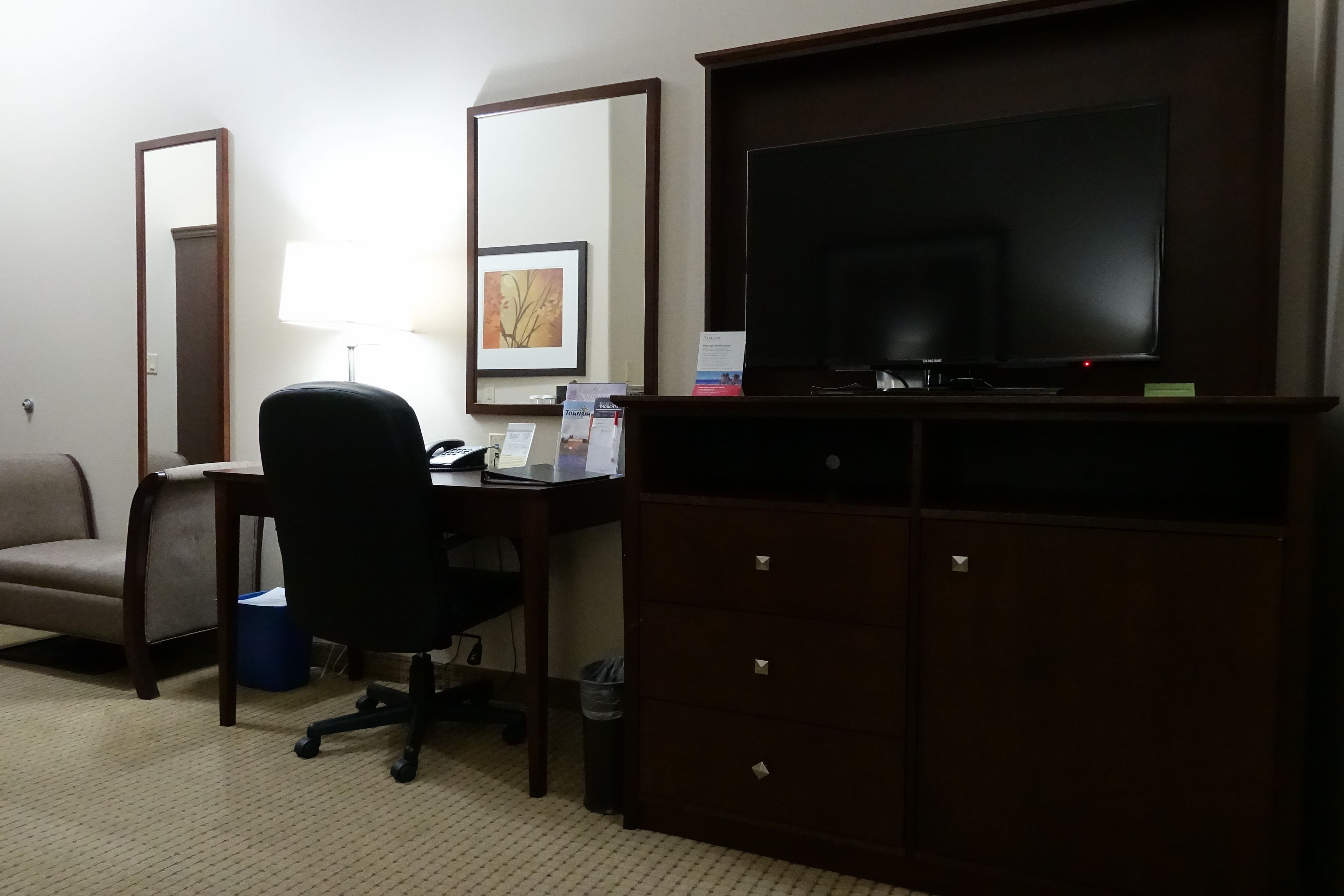 desk, laptop workspace, iron/ironing board, cots/infant beds