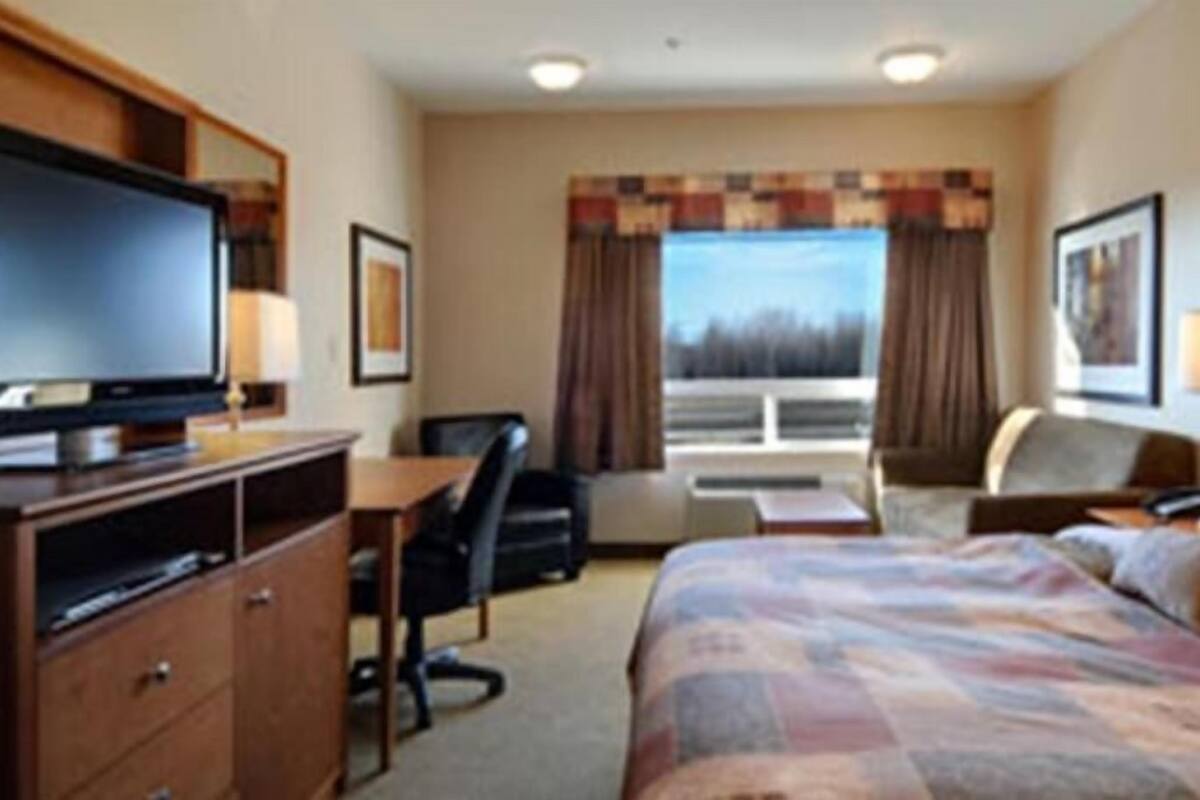 Desk, laptop workspace, iron/ironing board, cribs/infant beds