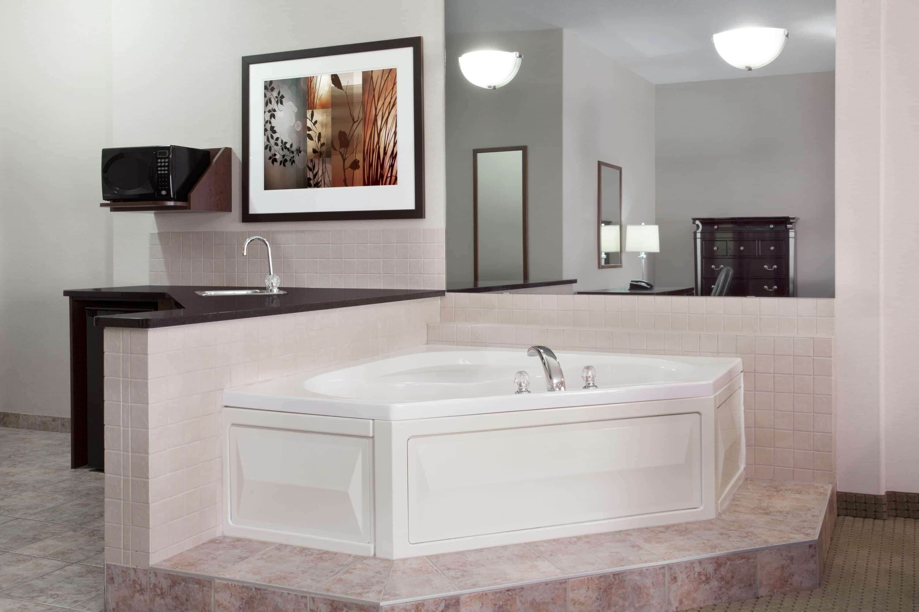 presidential suite, 1 king bed, non smoking | desk, laptop workspace, iron/ironing board, cots/infant beds