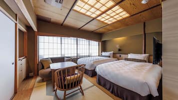 Chambre Économique avec lits jumeaux | Couette en duvet d'oie, articles gratuits dans le mini-bar