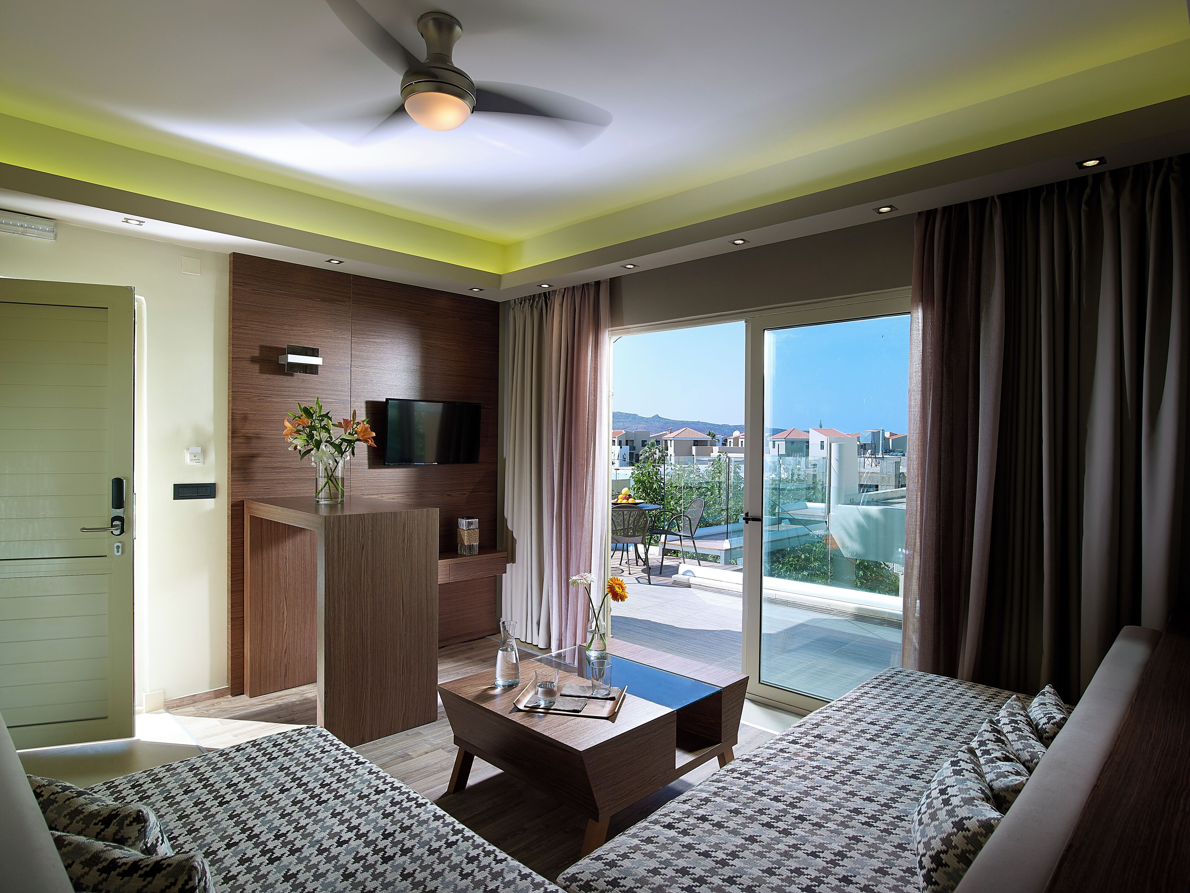 Premium One Bedroom Suite Split Level | Living area | 21-inch flat-screen TV with cable channels, TV