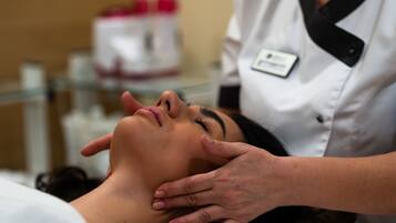A person receiving a facial treatment.