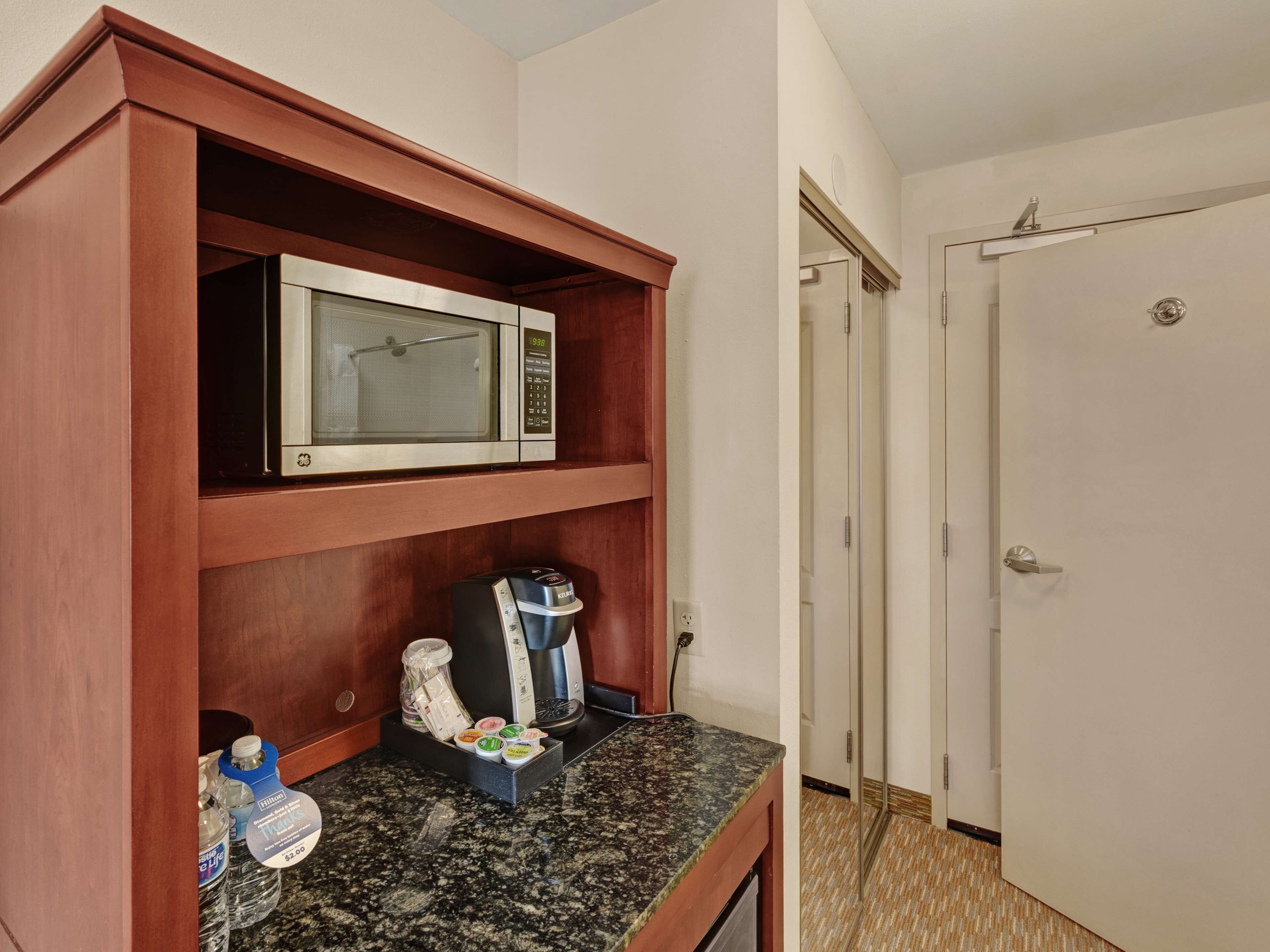 2 queens evolution rm | premium bedding, desk, blackout curtains, iron/ironing board