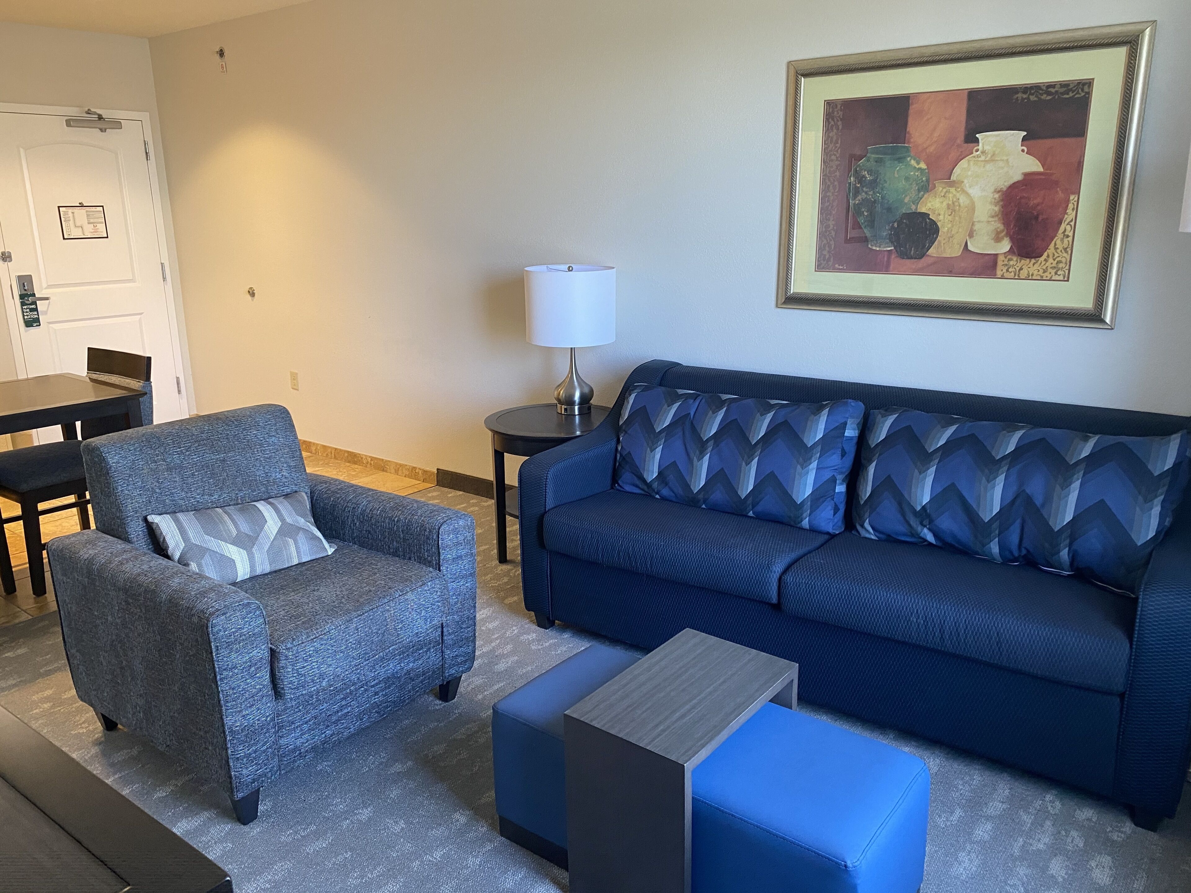 suite, 2 queen beds | living area | 39-inch flat-screen tv with cable channels, tv, dvd player