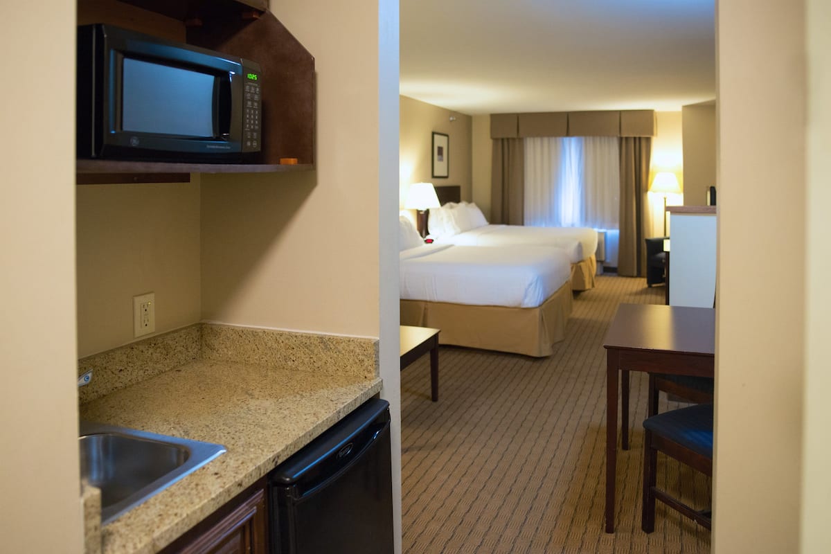 Suite, 2 Queen Beds | Premium bedding, desk, iron/ironing board, free cots/infant beds