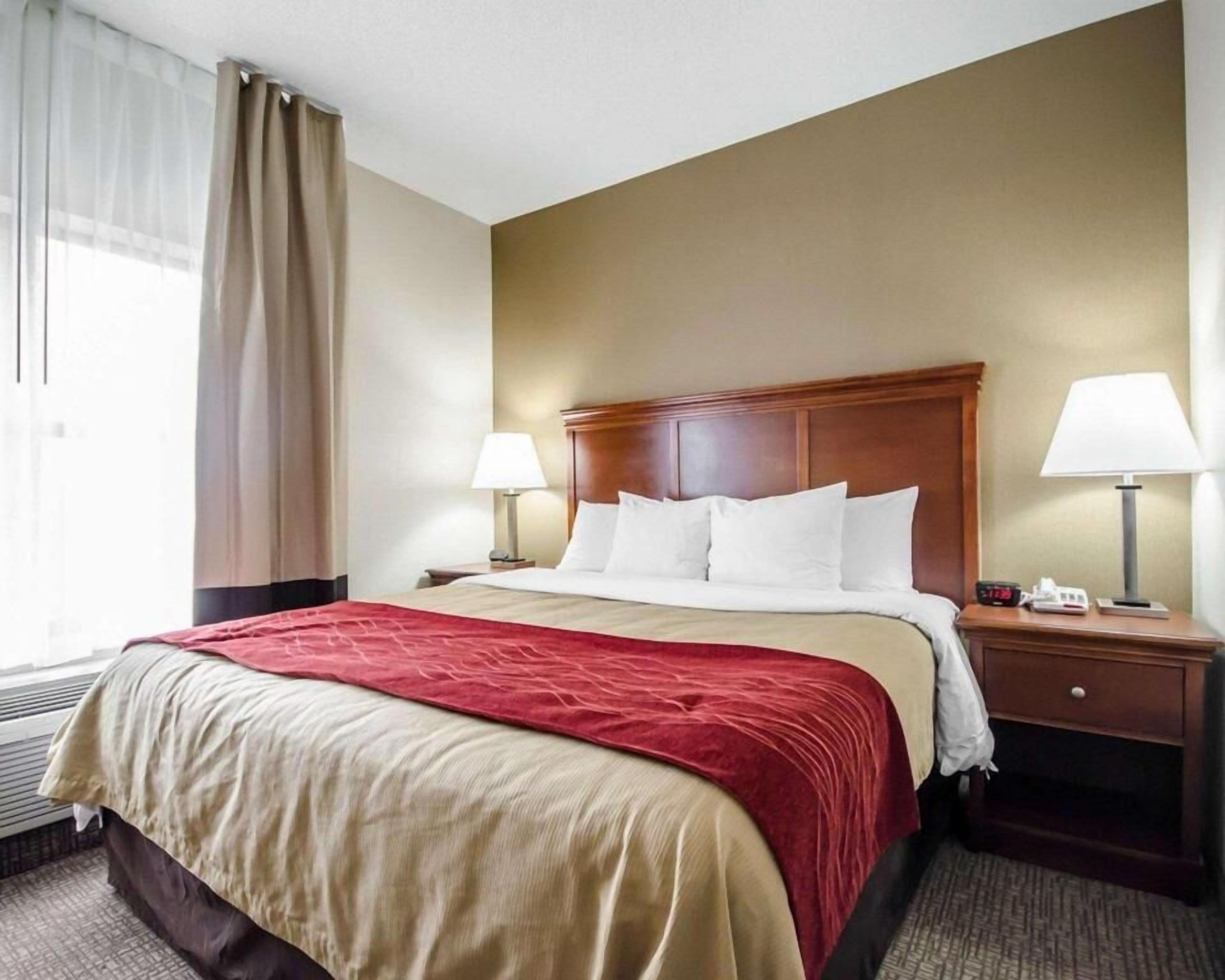 Pillow-top beds, desk, blackout curtains, iron/ironing board