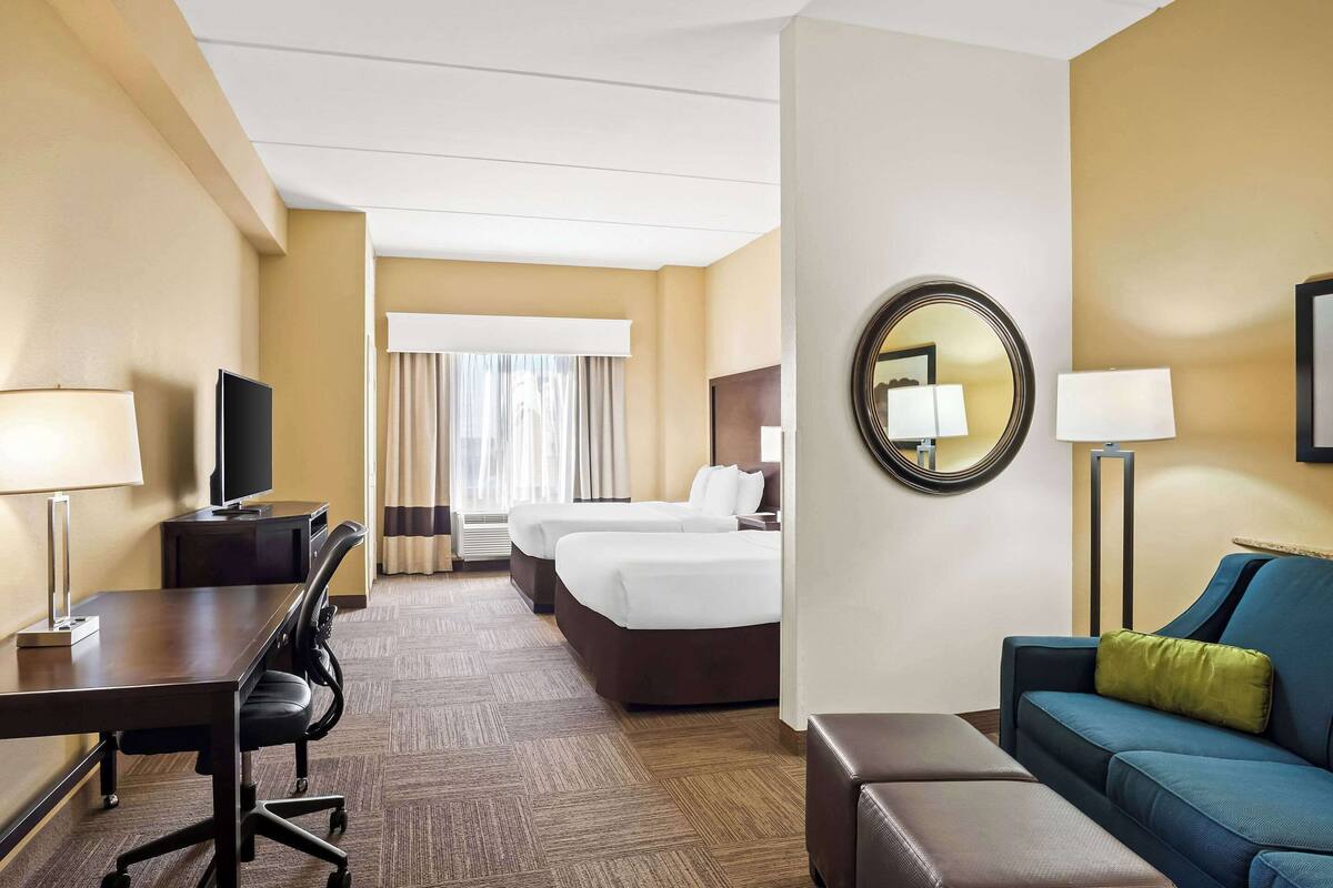 premium bedding, desk, laptop workspace, blackout curtains