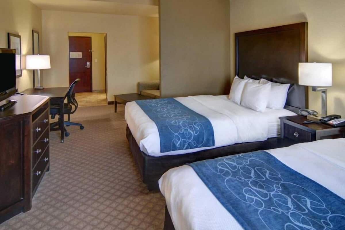 Premium bedding, desk, laptop workspace, blackout curtains