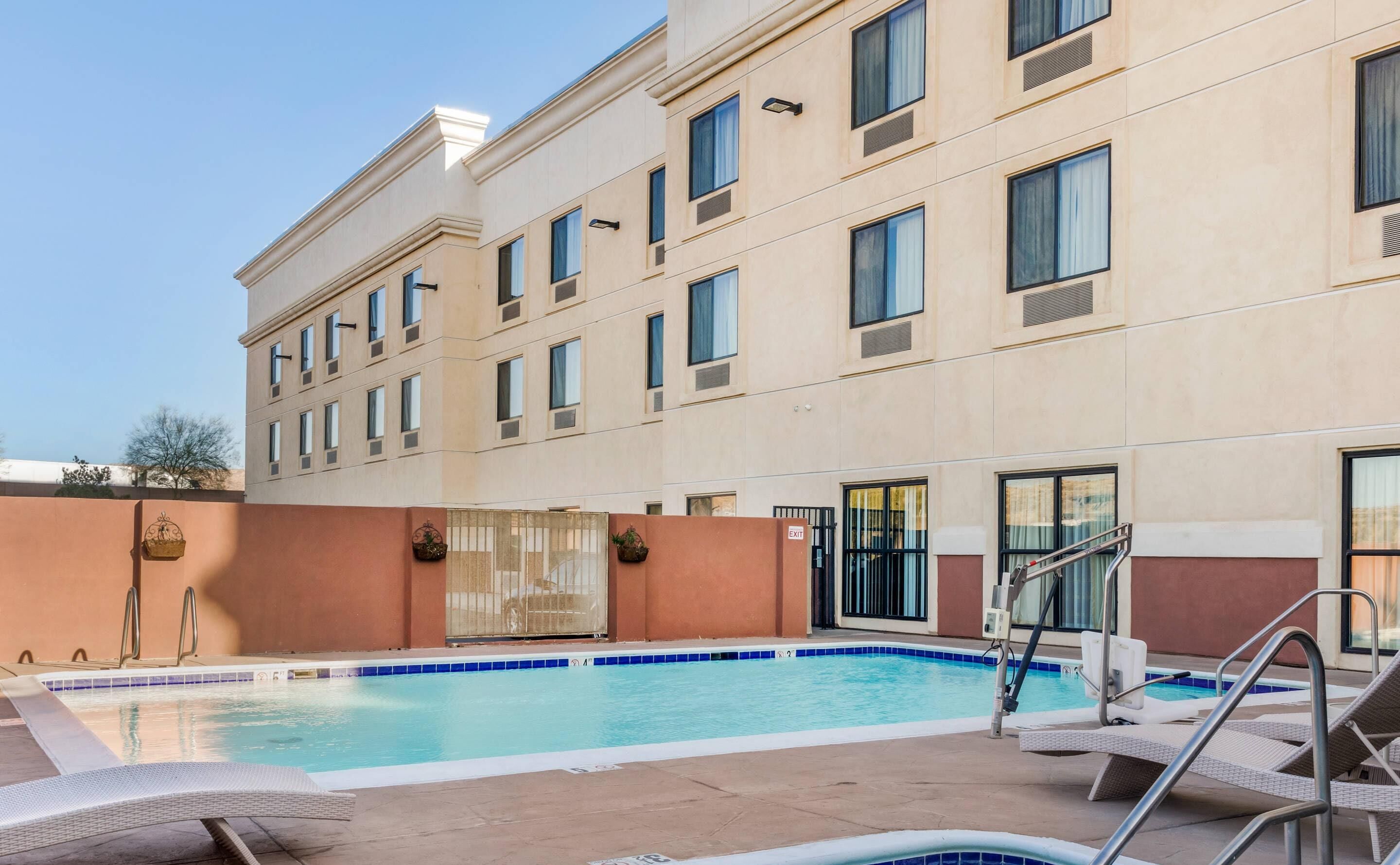 seasonal outdoor pool, open 6:00 am to 10:00 pm, pool umbrellas