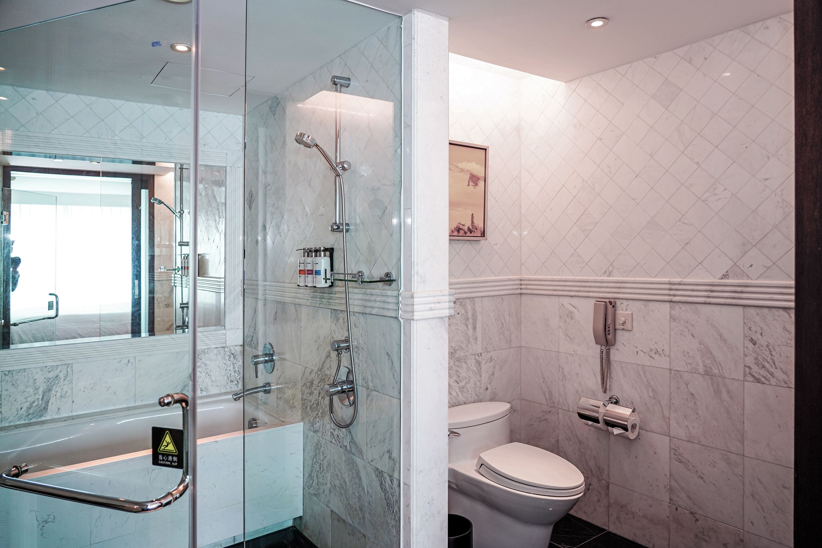 separate bathtub and shower, deep-soaking bathtub, designer toiletries