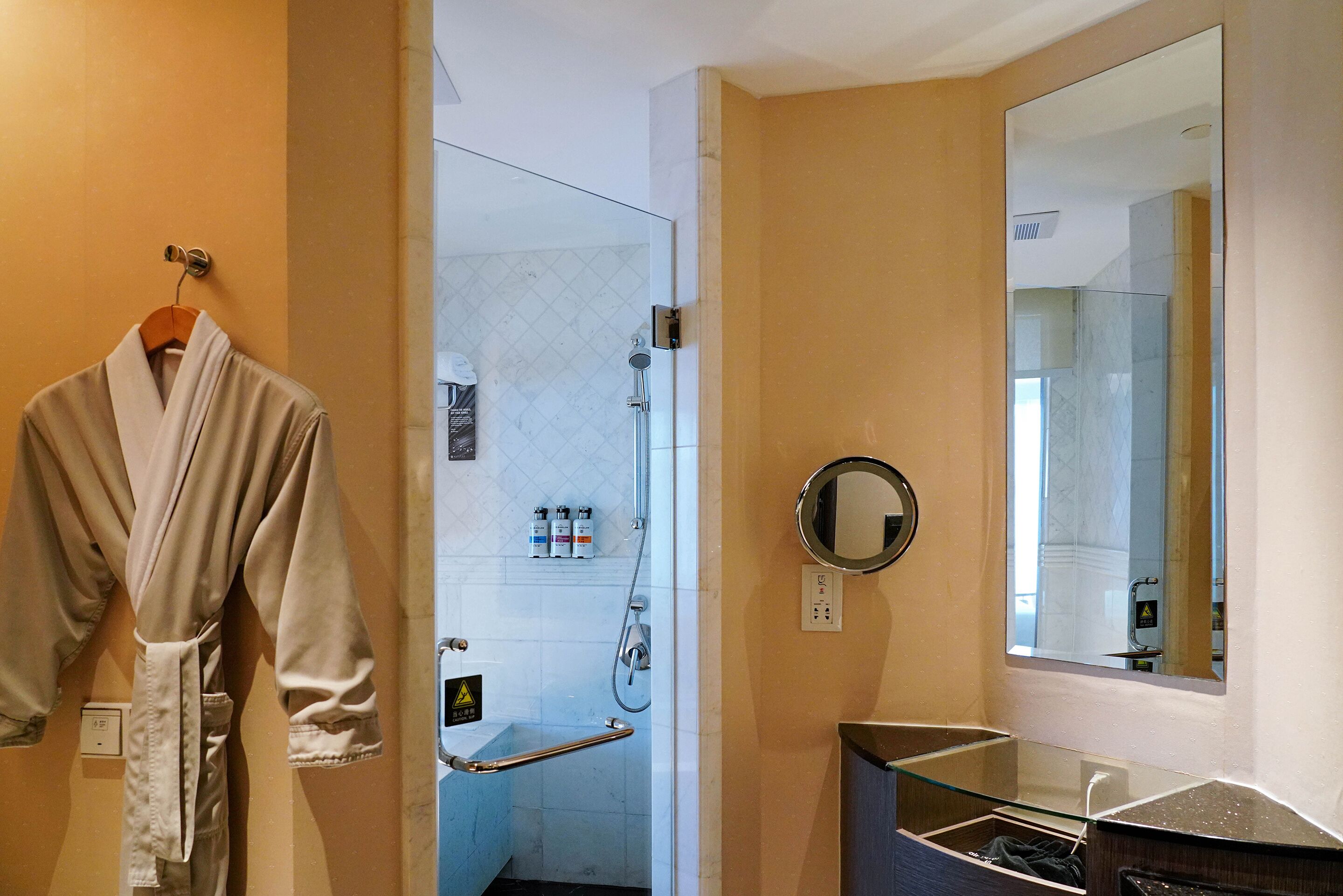 separate bathtub and shower, deep-soaking bathtub, designer toiletries