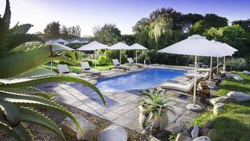 2 outdoor pools, pool umbrellas, pool loungers